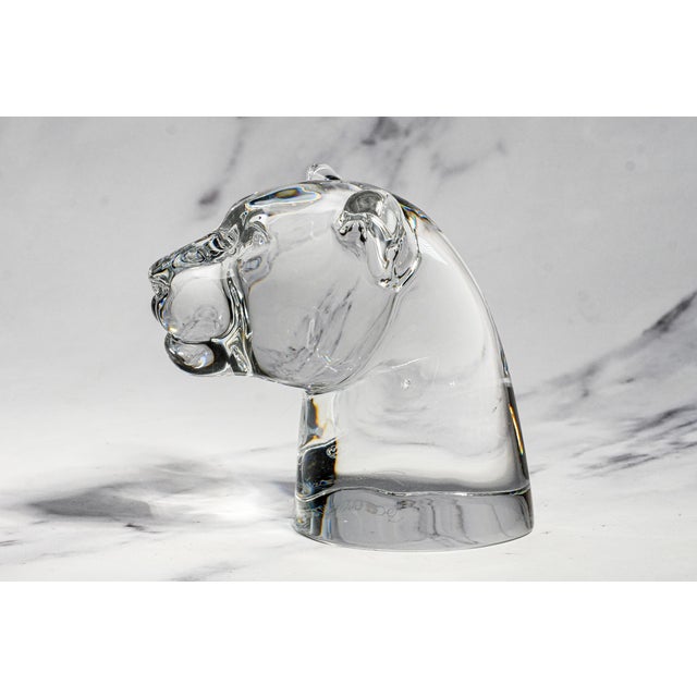 A striking example of Baccarat crystal craftsmanship, this vintage solid crystal sculpture captures the powerful presence...