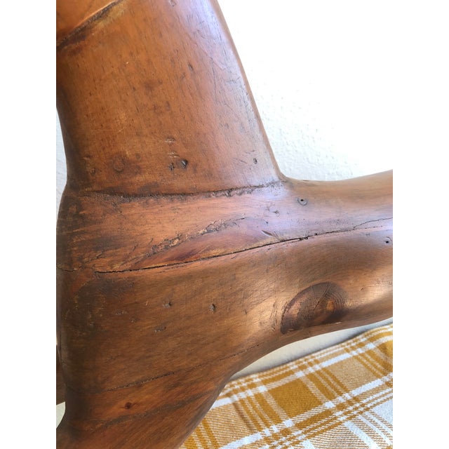Antique solid wooden primitive hobby horse. It features leather ears, a tail (most likely horsehair, though not tested),...