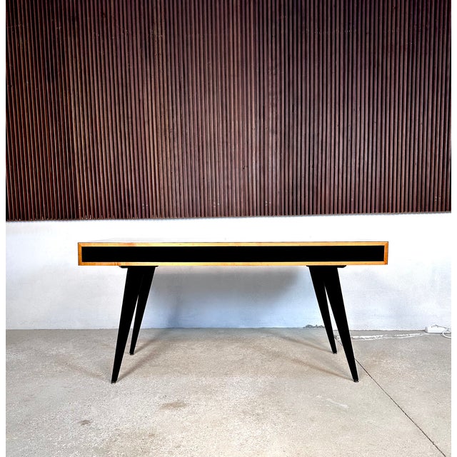 This rare high-quality writing desk is an authentic piece from the early 1950s, created by the famous Swiss architect and...