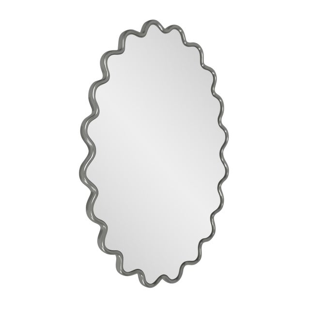 The Cloud Mirror features a wavy frame that is meticulously hand-painted in the USA. This mirror is designed to complement...