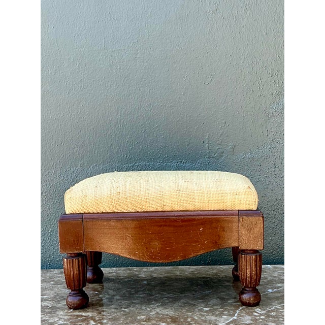 This charming vintage footstool is a testament to timeless traditional design with a tactile, organic twist. The base is...