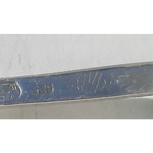 Made in Mexico circa 50s'. Each with a green agate handle and sterling stems. The length is 4.6". Marked Hecjo en Mexico...