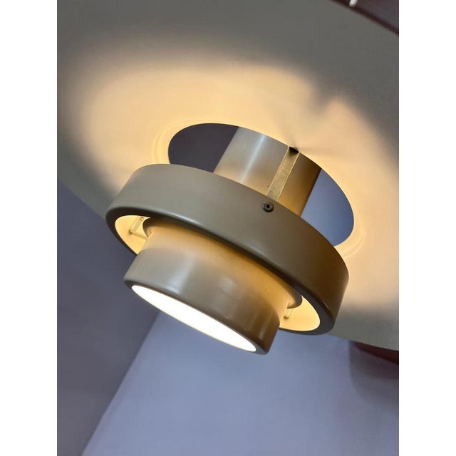 Cable length and color available upon request. The Falcon lamp, designed by Andreas Hansen in 1969 for the Danish...