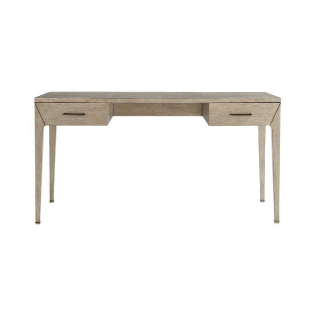 This petite desk puts forth a simple and straightforward style. Its functional design favors clean lines and absolute...