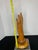 This antique hand carved wooden hand from the 1800s was used in shops to showcase ladies gloves. The hand sits on an...