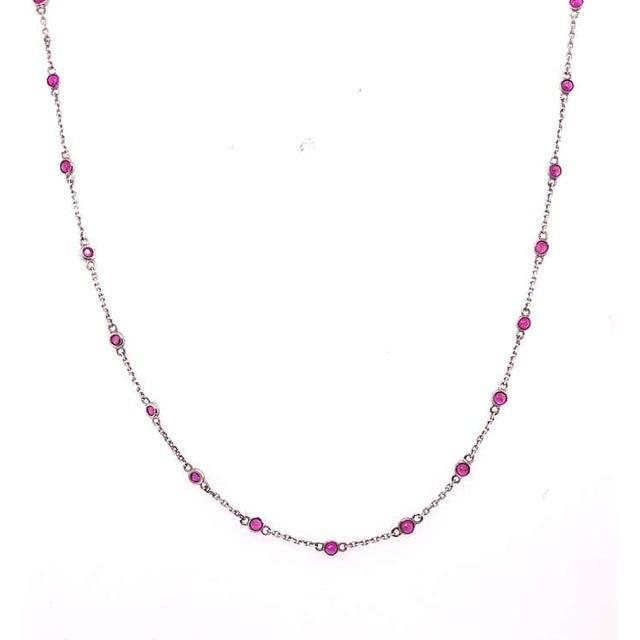 14 Karat White Gold 18 Inch Oval Link Necklace having 36 stones approx .3cts each. Approx 1ct Total. 2.57 grams total...