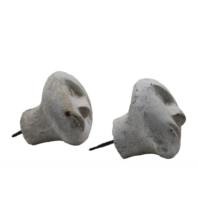 Pair of Stone Coat Hook Knobs, Italy 1970s Decorative stone sculptures in the shape of human heads used as decorative...
