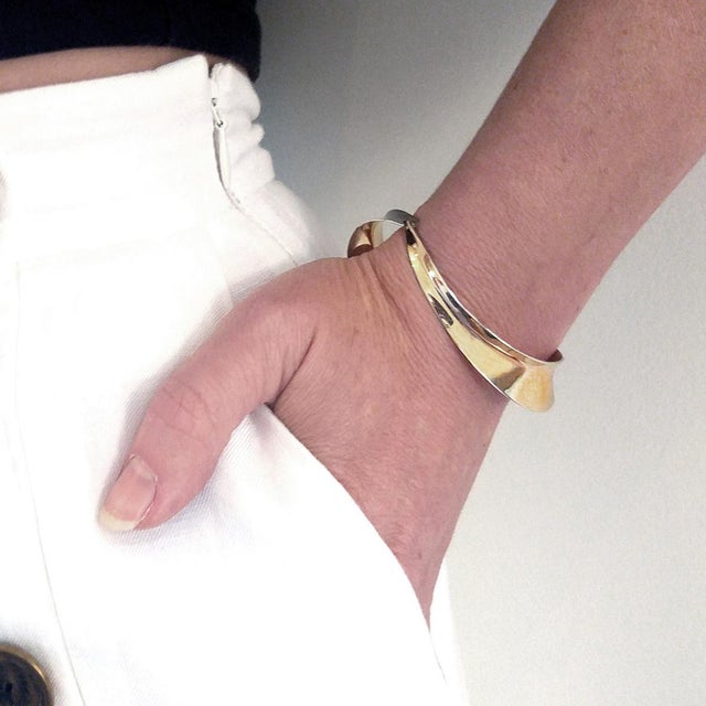 This Modernist Gerhard Herbst Studio Bangle is hand constructed from two individually hand forged components. Measuring...