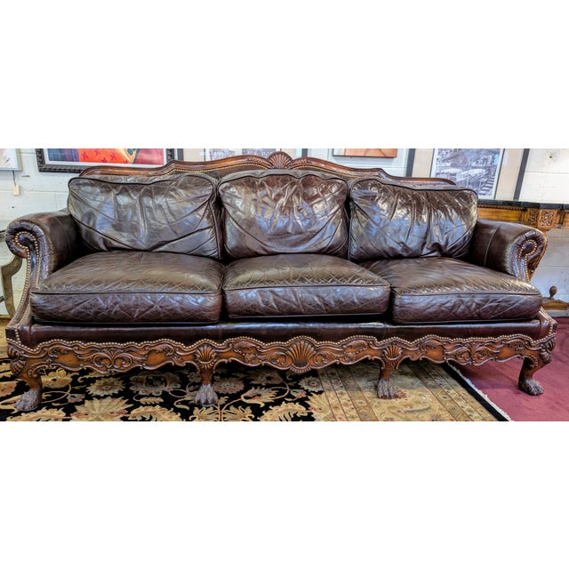 Whittmore Sherrill High-Quality leather sofa crafted in a rich mahogany frame with ball & claw feet, adorned with nail...