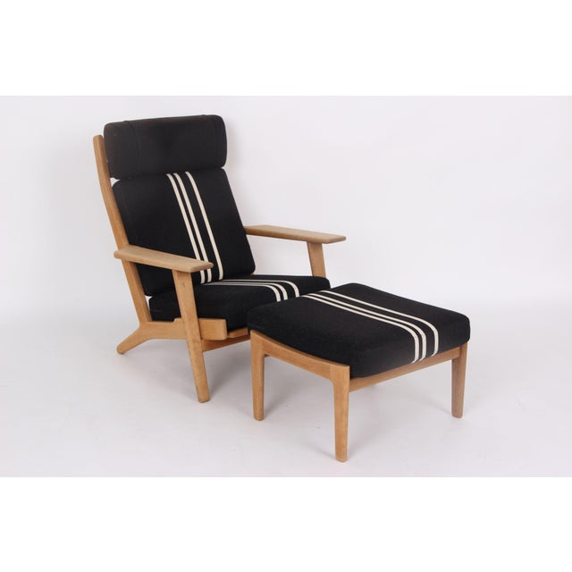 Hans j. Wegner armchair model ge290a and associated footstool ge290s hans j. Wegner designed this model in the 1960s and...