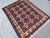 A vintage Afghan Turkmen tribal rug in an uncommon ivory-dominant colorway — a bold cream diamond lattice grids the field,...
