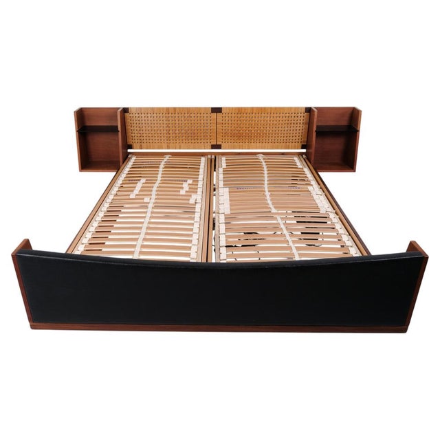Model ge 701 double bed designed by hans j. Wegner and manufactured by getama in the 1950s. Crafted in veneered and solid...