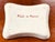 A delightful vintage French porcelain catchall featuring the hand-painted phrase: “Qui va doucement va sûrement.” The...