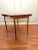 The warm deep honey toned colored wood, clean lines and minimalist detail enhance this Scandinavian Danish modern style...