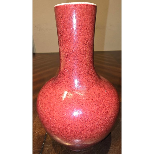 Chinese Sang de Boeuf (Oxblood) Glaze Vase has measurements of approximately 5.5"x5.5"x8.75".