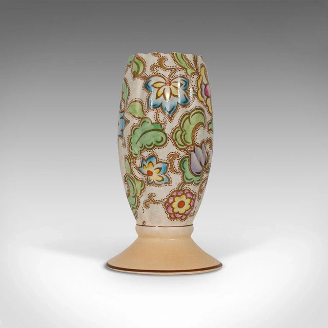 This is a small vintage flower vase. An English, ceramic goblet urn in Art Deco taste, dating to the mid-20th century,...