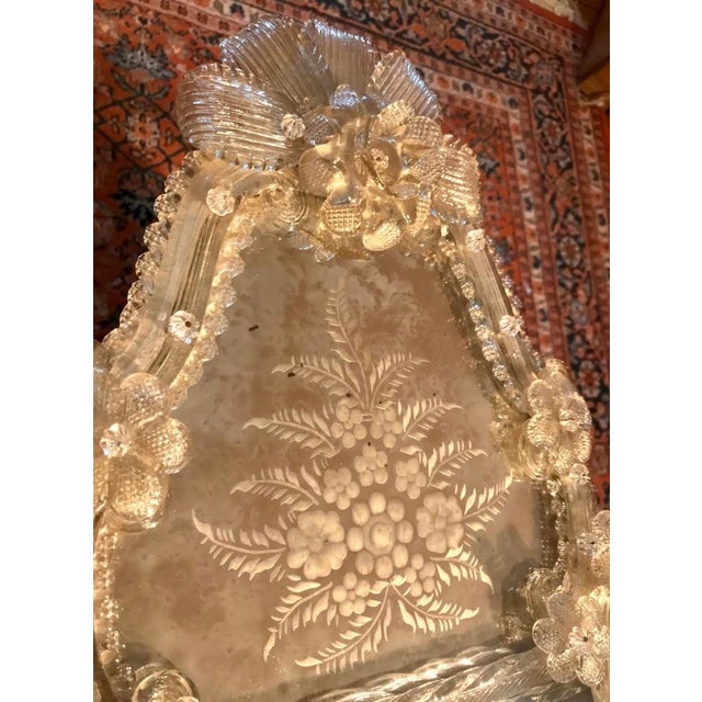 A very high-quality, large repoussé Venetian Murano cushion mirror. Luxuriously and intricately crafted. The glass is...