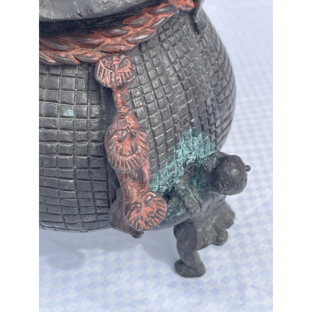 Metal Mid 19th Century Bronze Incense Burner Money Bag Supported by 3 Men For Sale - Image 7 of 13