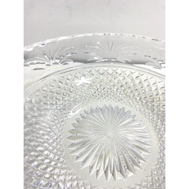 A beautifully detailed crystal bowl. Marked Stuart. It's nice and heavy. No flaws that I can see.