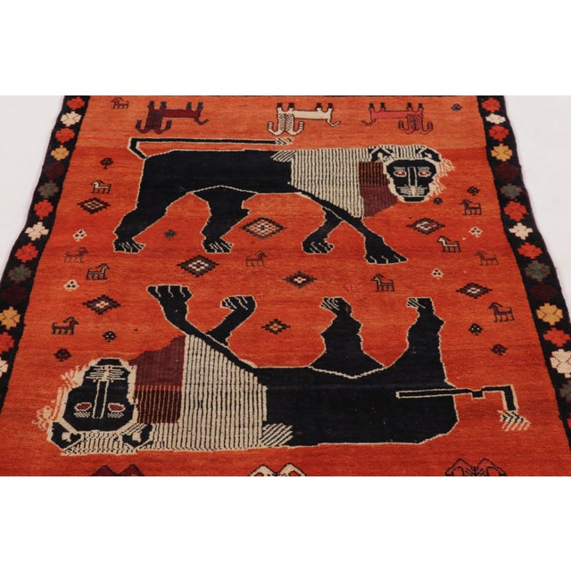 Hand-knotted in wool circa 1950-1960, this 4x5 vintage Persian Gabbeh rug is an expressive example from Rug & Kilim’s...