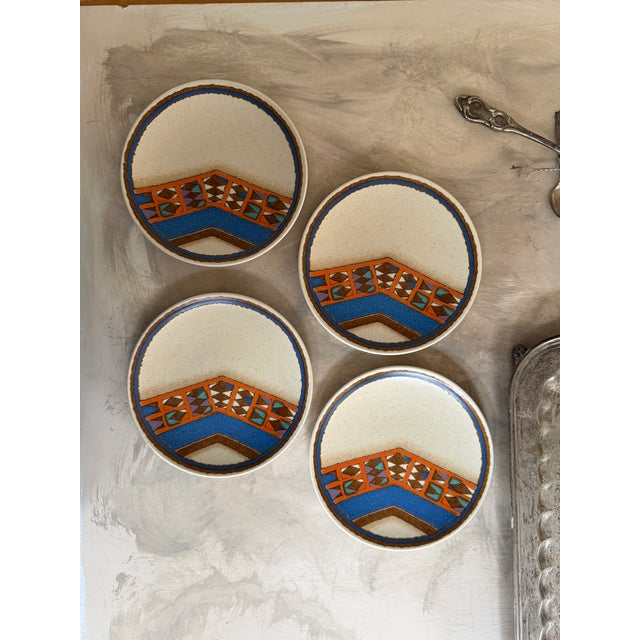 A bold and nostalgic set of four Mikasa Indian Feast in the Teepee pattern, model DE853. This design captures that...