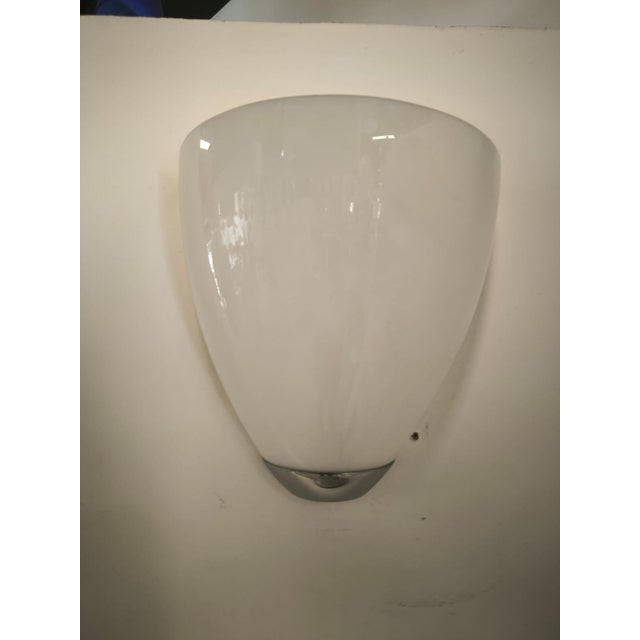 Glossy White Murano Wall Light, 1990s, in Very Good conditions. Designed 1990 to 1999 This piece has an attribution mark,...