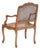 A charming Louis XV style armchair crafted in walnut with hand carved Rococo detailing throughout. The shaped crest rail,...