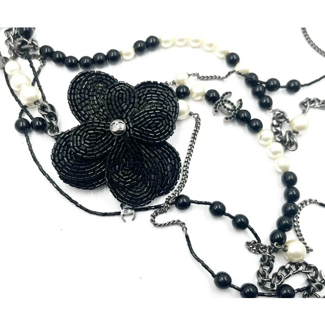 Contemporary Chanel Black CC Beaded Flower Pin Black Bead Pearl 5 Strand Necklace For Sale - Image 3 of 5