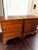 Keller Furniture Co. solid oak/wood nightstands. 24"W × 16"D × 28"H. One of the nightstand drawers is lined with green...