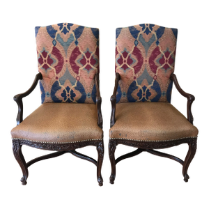 A Pair of French Hand Carved Walnut Arm Chairs