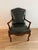Anglo-French Louis XV interpretation. Cabriole legs with carved details, front hoofed feet. Curved arms and backrest.