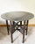 Industrial Moroccan Side Table With Round Raw Steel Top + Weathered Folding Base For Sale - Image 4 of 16