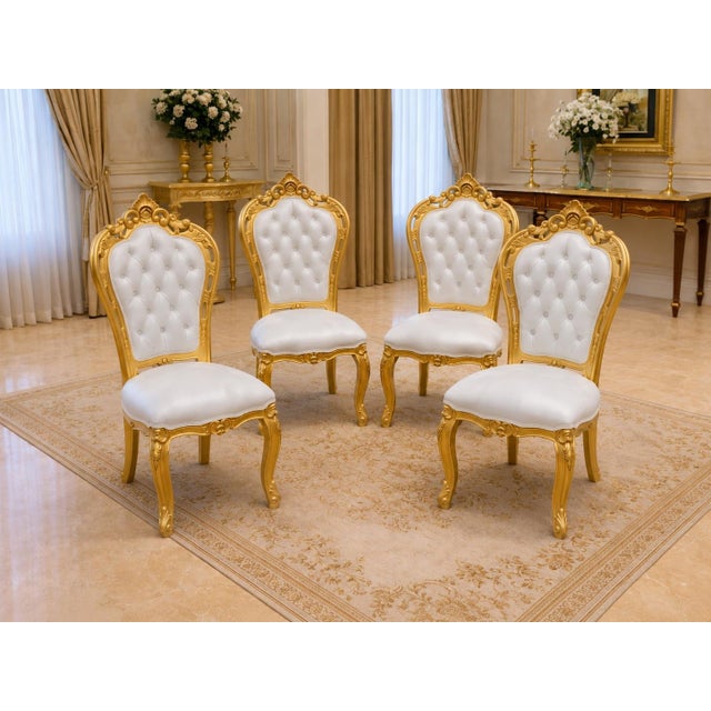 This striking set of four late 20th-century Italian Baroque Revival dining chairs combines dramatic sculptural carving...