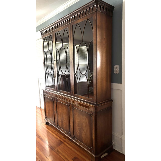 By Bevan Funnell, who were well known furniture makers based out of Newhaven, England. A handsome mahogany three-door...