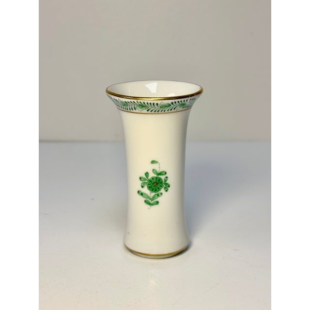 This charming Herend porcelain bud vase features the "Apponyi Green" pattern, also known as "Chinese Bouquet." The pattern...