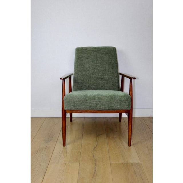 Vintage armchair 'Lis' from the 1970s in olive green, designed by Henryk Lis. Two pieces available. Restored iconic Henryk...