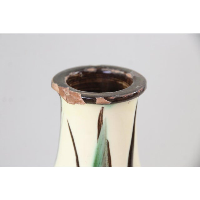 A magnificent large Danish decorative earthenware vase by Herman A. Kähler, dating to circa the 1940s. This impressive...