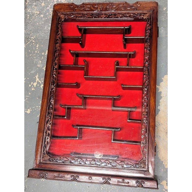 These are a pair of vintage Chinese carved hardwood shadow box curio display cases (modeled in the traditional Duobogei or...