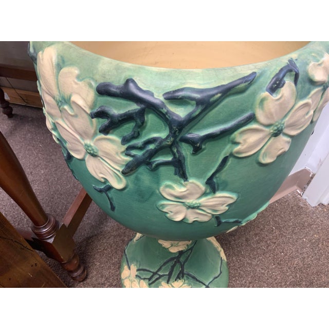 20th Century Roseville Pottery Jardiniere with stand. Beautiful dogwood pattern with flowers and branches. Hard to find...
