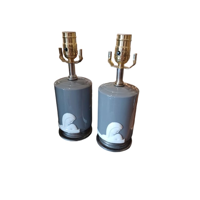 Vintage pair of Milky gray porcelain lamps of Woman in Profile. Lamps on on original base with new wiring and new. Switch...