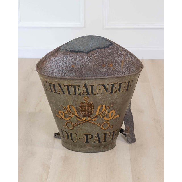 Made in France in the nineteenth century, this grape hod is a vessel of the type used during the wine harvest to carry...