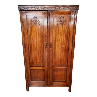 Vintage 1930's English Ray & Miller Walnut Armoire With Shell Motif For Sale