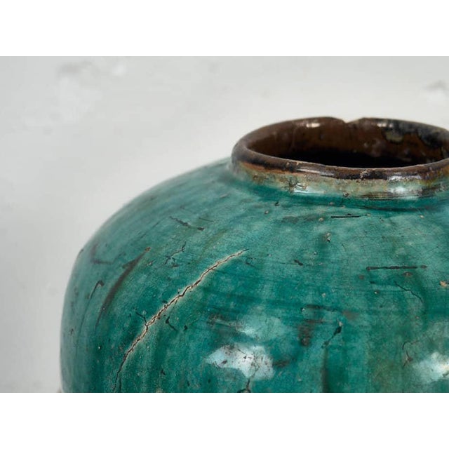 Antique emerald green ceramic vase (c.1820). Approximate year of manufacture: 1820. This antique ceramic vase has a height...