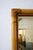 Rectangular wall mirror with a double bamboo cane frame in a natural finish. The corners feature rattan bindings.