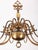 Beautiful eight-armed flemish chandelier made of patinated brass. The upper part of the chandelier is decorated with a...