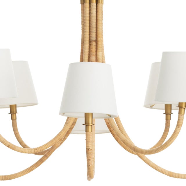 Introducing the Treble Chandelier, a timeless addition to your coastal-inspired decor. Embodying a classic bent arm...