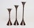 Set of three graduated hammered brass candlesticks made in India for Rosenthal Netter (ca. early 1980s). Chic...