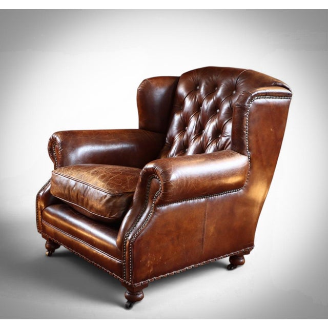Up for grabs here is a stunning and rare armchair by timothy oulton. "a traditional form updated with modern comfort." a...