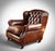 Up for grabs here is a stunning and rare armchair by timothy oulton. "a traditional form updated with modern comfort." a...