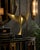 Graceful and sculptural, this 1980s Art Deco style brass bird sculpture captures the elegance of a crane in flight with...